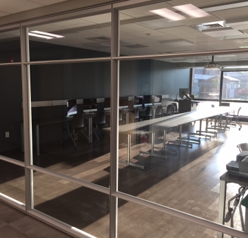 Buckham hall B wing computer lab view of tables with computers